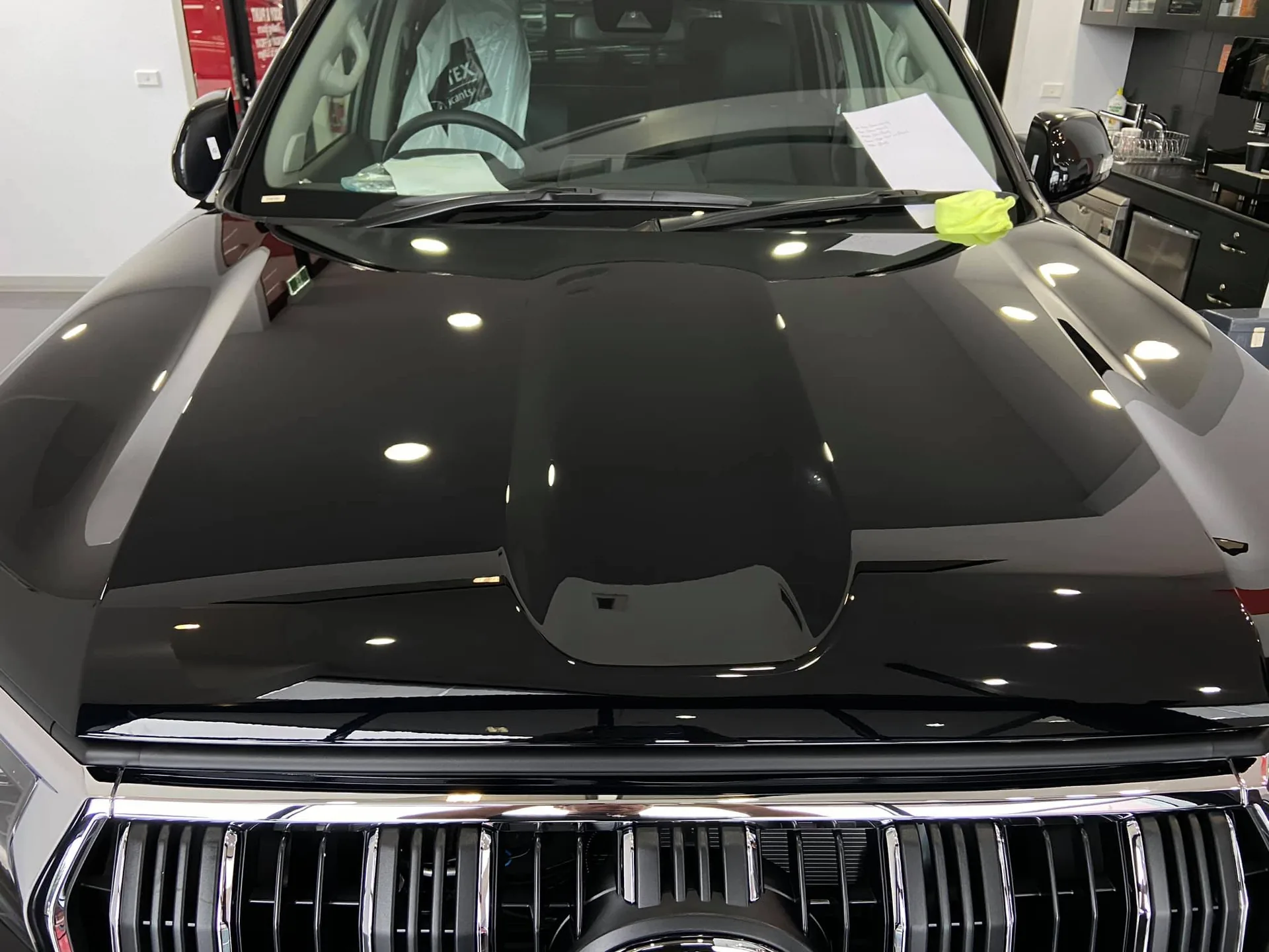 Black Audi SUV bonnet and grille after treatment