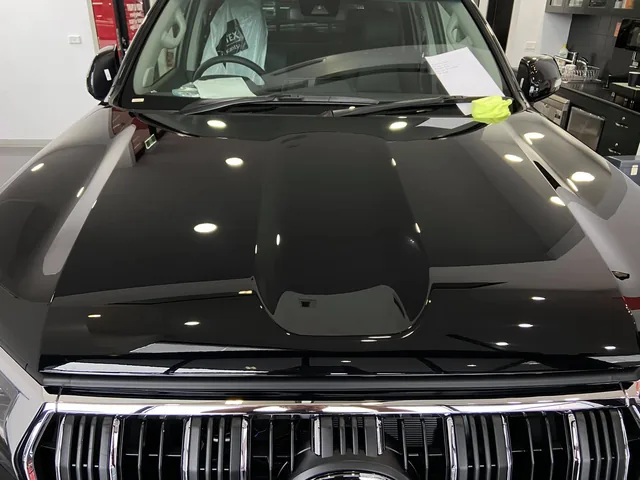 Black Audi SUV bonnet and grille after treatment