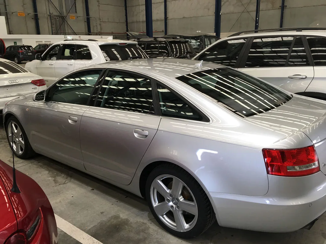 The same silver Audi after graffiti removal, original paint intact