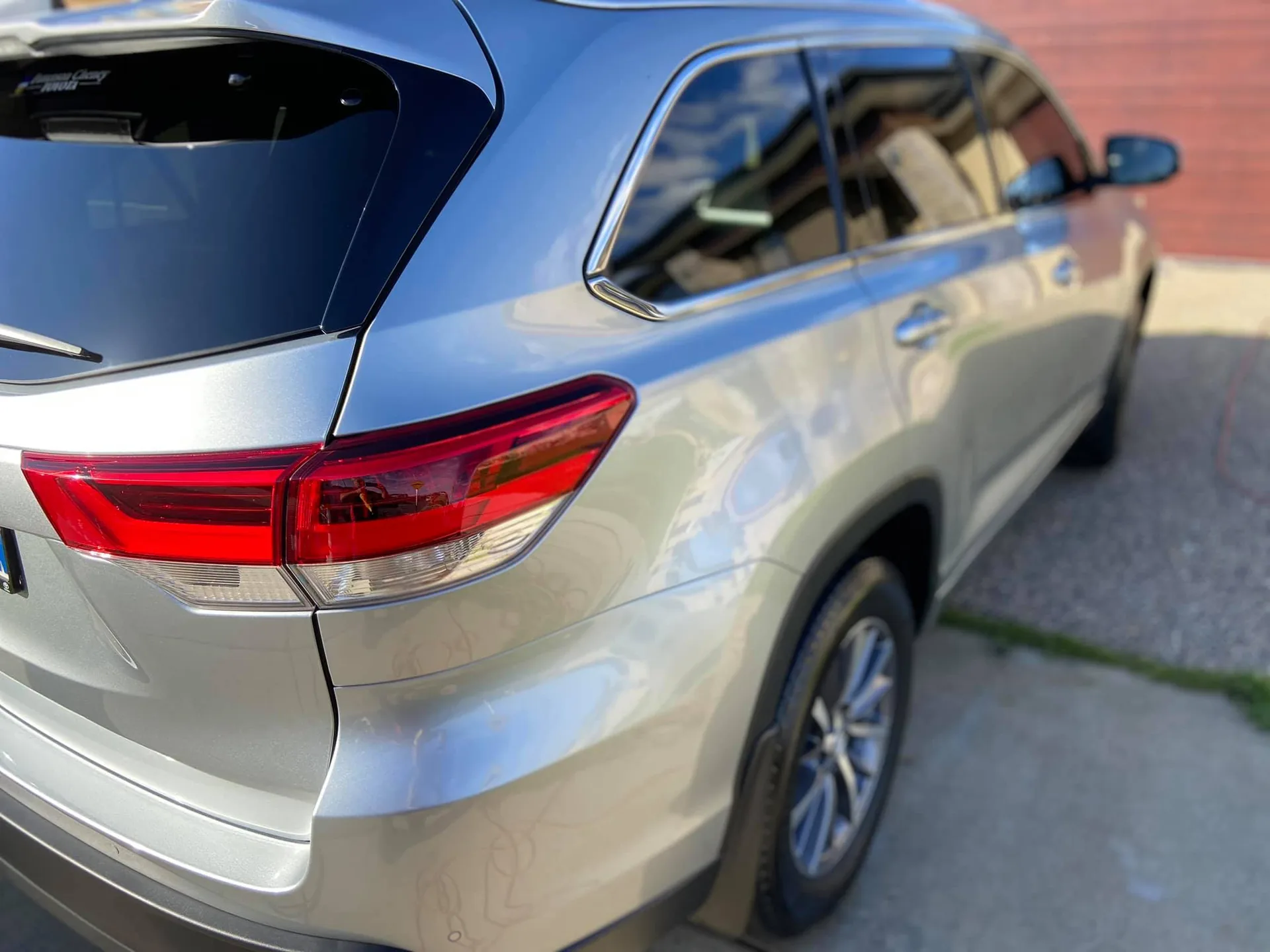 Silver Toyota Kluger rear after restoration