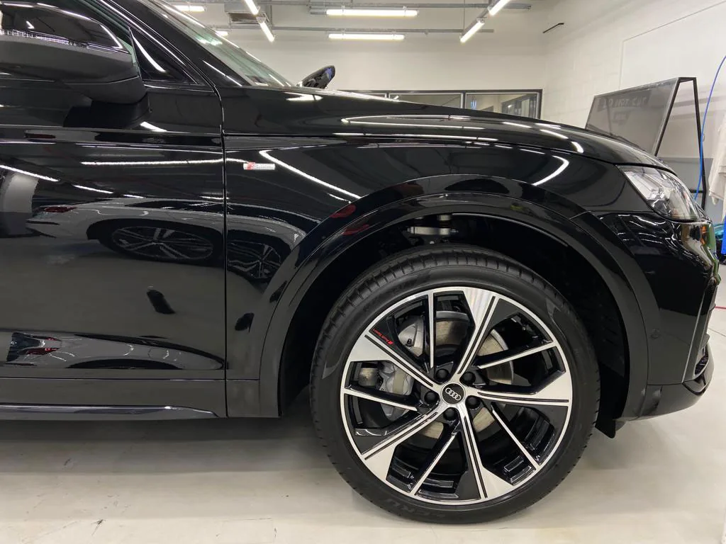 Black SUV restored to gloss after fallout removal
